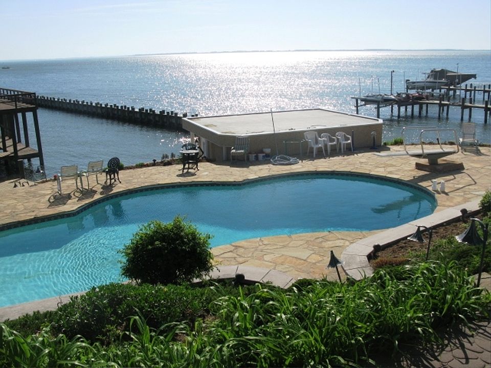 our private saltwater pool with 12 foot depth for safe diving