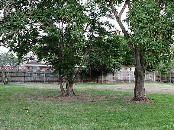 part of the back lot next to house