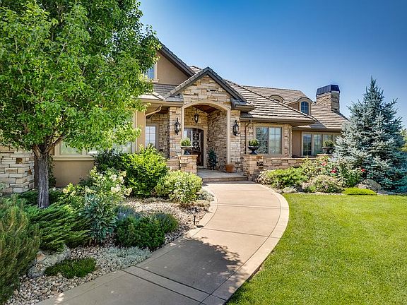 Warm welcome and lushly landscaped