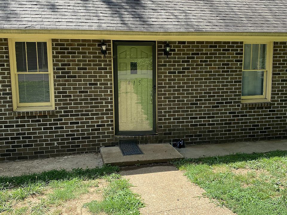 Front walk to Brown Ave. and to each side of the thru driveway.