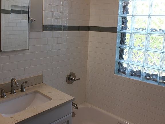 Updated bathroom, new tile and fixtures