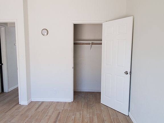 Stylish bedrooms with walk-in closets.