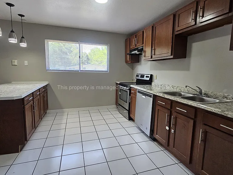6809 Miss Muffet Ln S — Photo 9