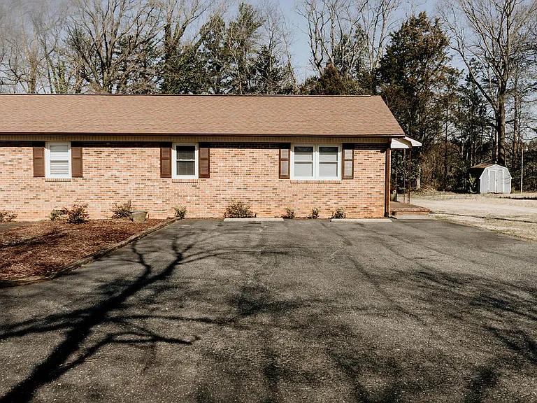 Enjoy hassle-free parking with two dedicated spaces located directly in front of the unit for easy access.
