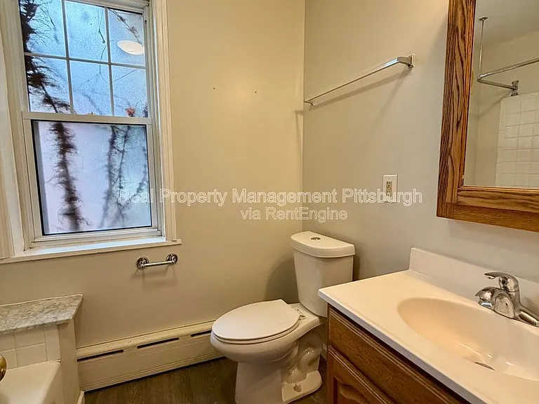 5550 Wilkins Ave — Photo 2