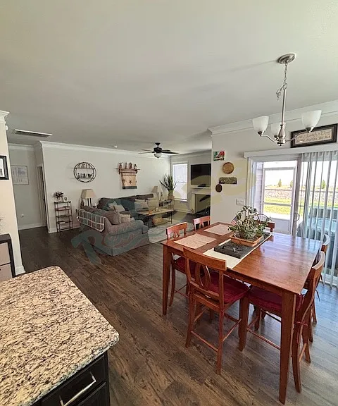 view from kitchen into dining and living room areas