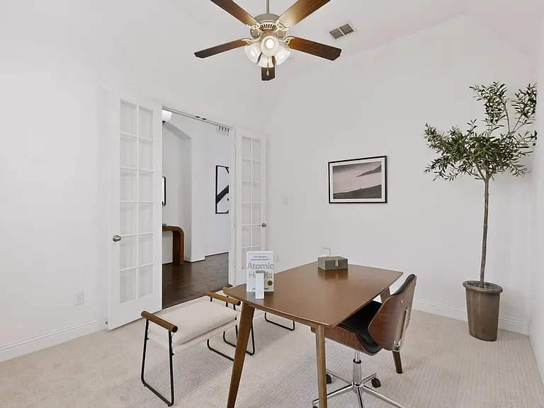 Bright office with a ceiling fan