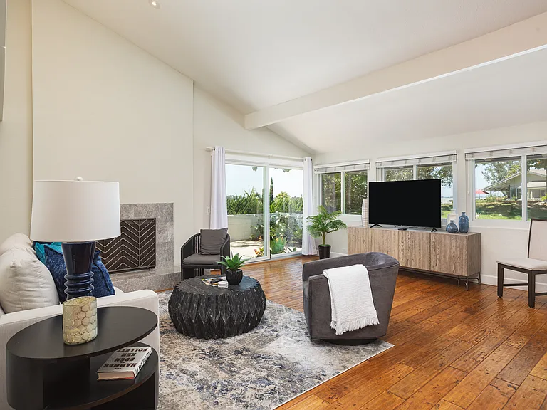 Relax in the open floor plan with cathedral ceilings and enjoy a home with ultraviolet HVAC, killing viruses, bacteria, and fungus providing a clean airy home.