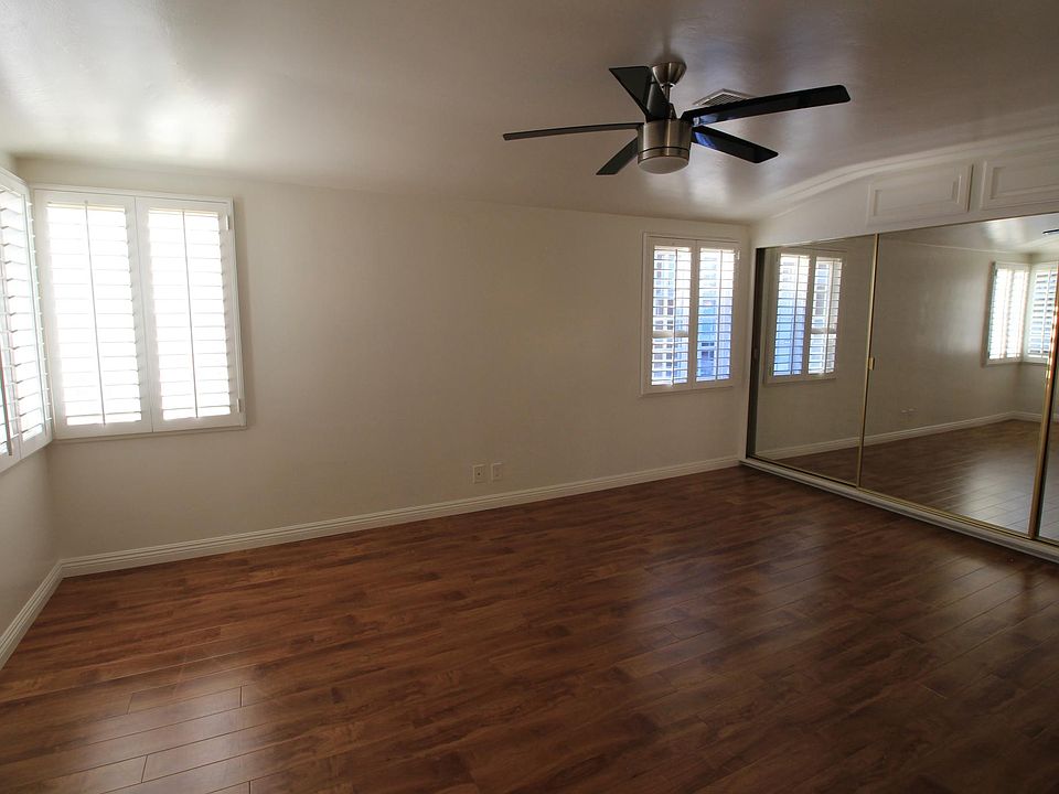 Master Bedroom with 2 windows facing Lido and window facing east for lots of natural light