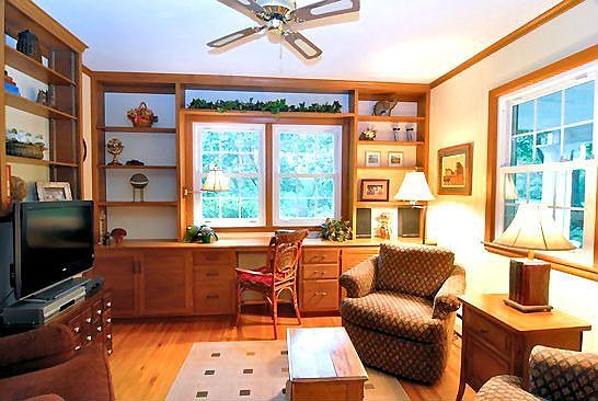 Main floor bedroom is currently used as a den