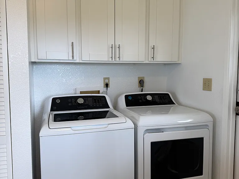 newer washer and dryer, laundry area.