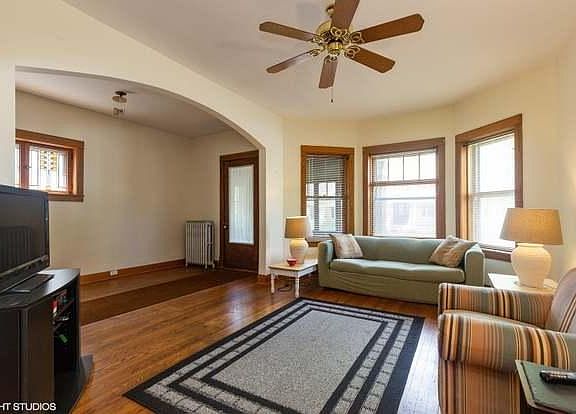 Living room and front entry. Beautiful Frank Loyd Wright studio handmade stained glass windows