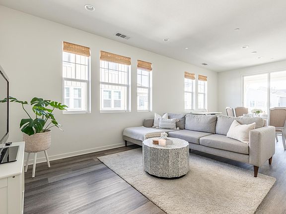 Open concept living to dining area