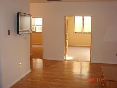 Living room with included Wall mount flat screen TV