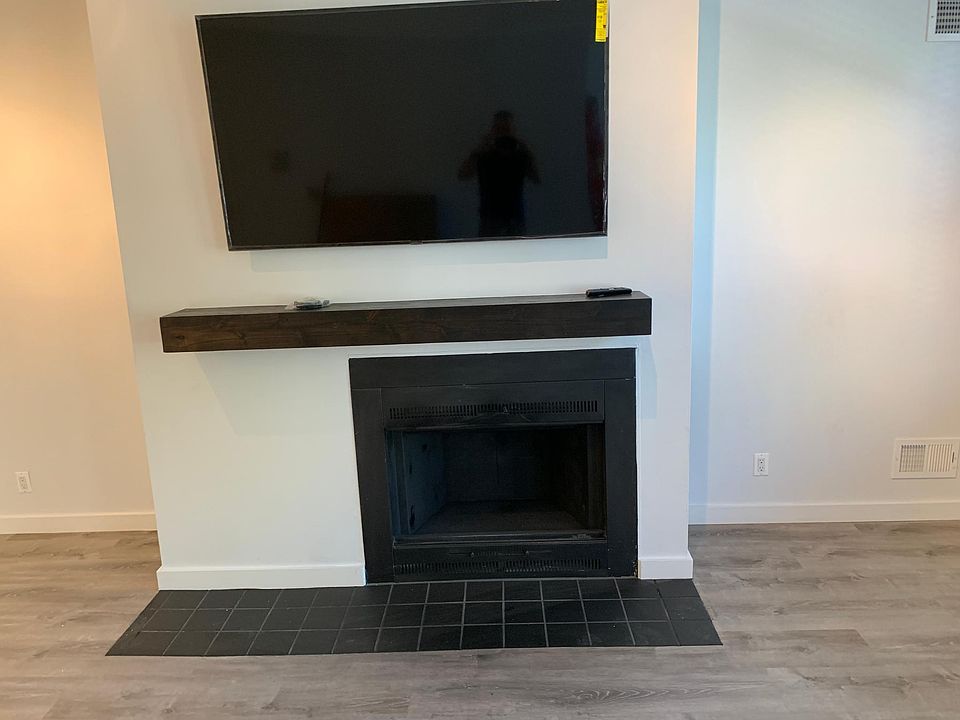 Wood-burning fireplace. TV included with unit.