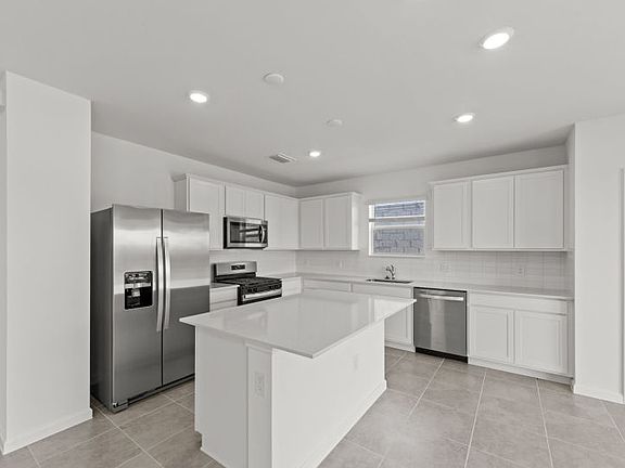 Chef-inspired kitchen with designer finishes