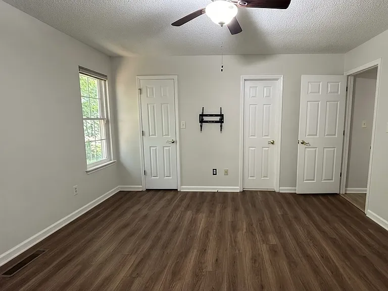 Primary Suite with walk-in closet and private bath