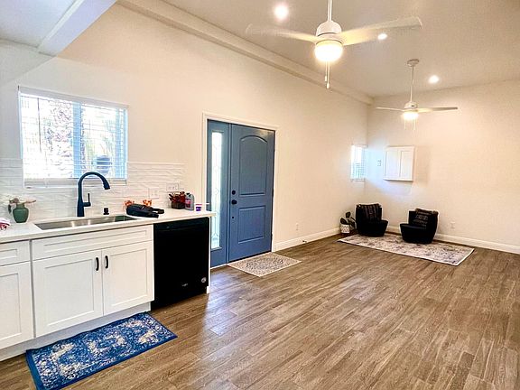 View to Entry. Open Plan with Kitchen, Dining and Living Room combined.