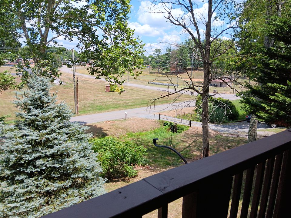 Beautiful, quiet, peaceful view from the large front porch. Listen to a peaceful stream as you relax in the serene setting on the covered front porch with your favorite coffee or in the evening as the sun sets.