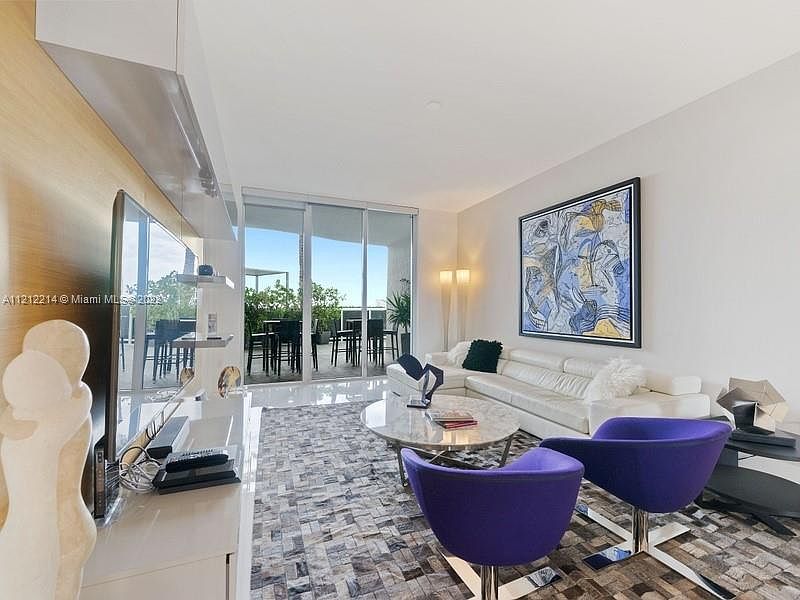 Great living area opens to a huge terrace and pool.