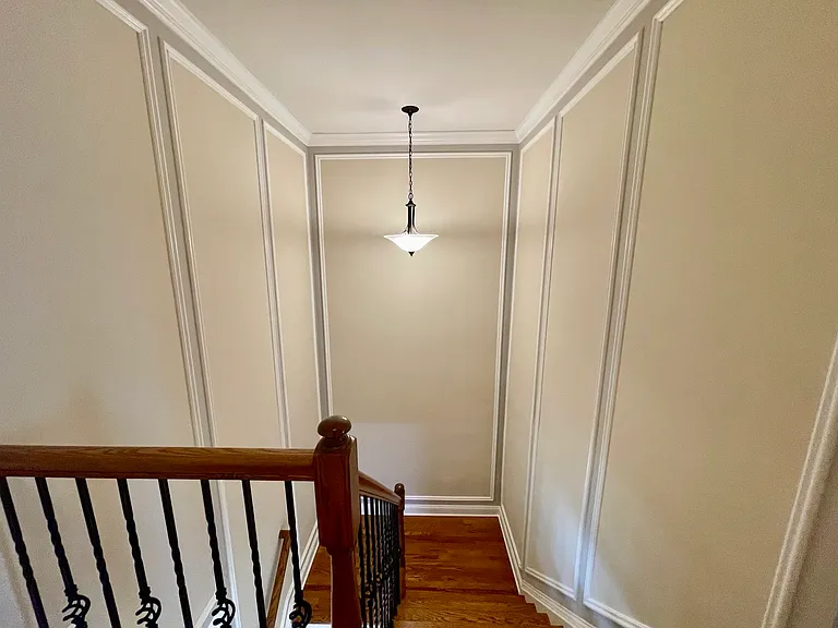 Graceful staircase and landing enhancing the home's elegant flow