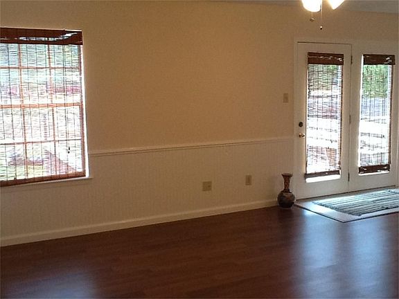 The home has been COMPLETELY REDONE. Laminate floors, bead board wainscotting, fresh paint,& wood blinds.