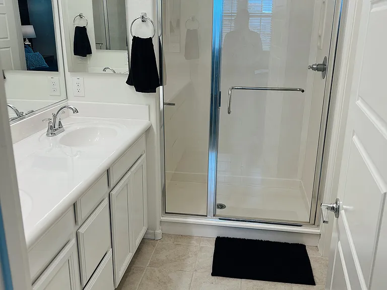 Primary bathroom with walk-in closet