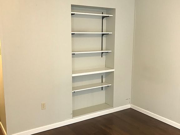 Living area with built-in shelves