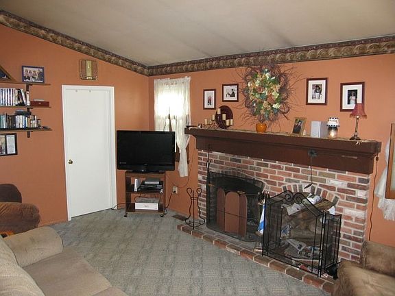 Cozy family room with brick fireplace