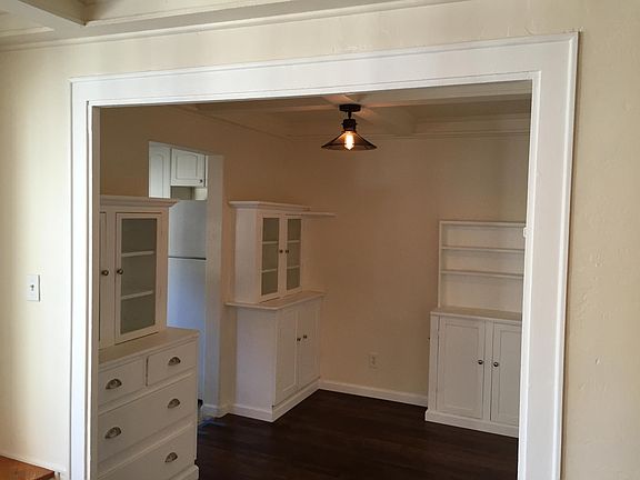 Dining room with vintage built in cabinets.