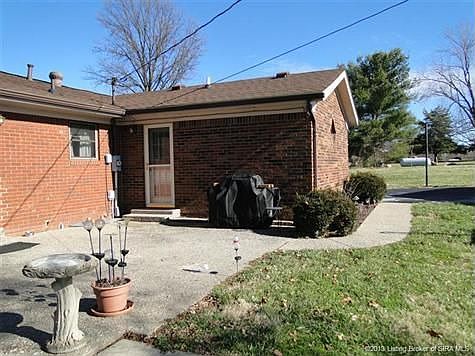 Nice patio area with access to and from dining area and back of house and to basement.