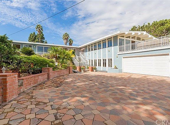 Beautiful Paved Concrete Driveway Welcomes You to the House