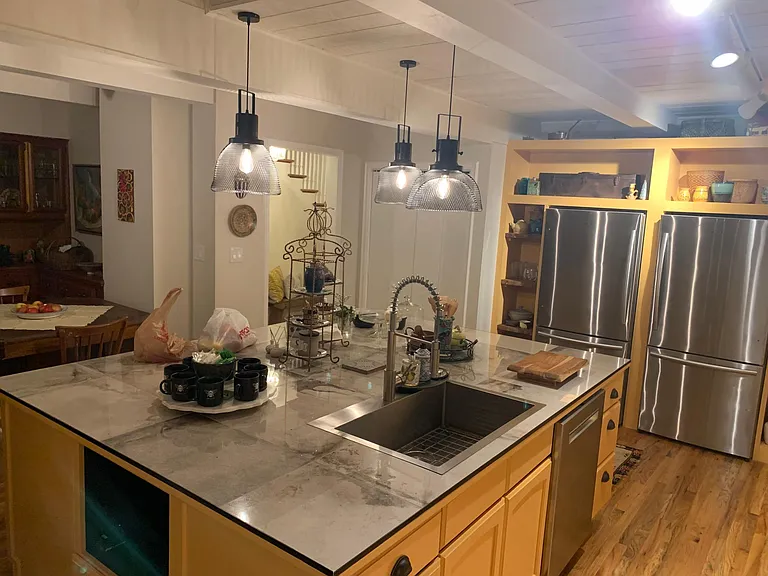Gourmet kitchen with 8 x 6 island perfect for entertainment & family gatherings
