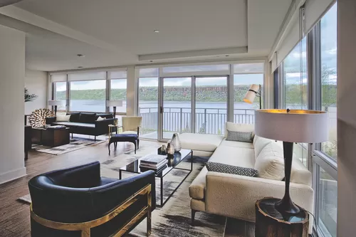 Living Room with Panoramic Hudson River Views - River Tides