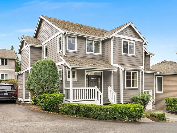 Extra exterior parking to the side of the home in addition to 2 garage parking.