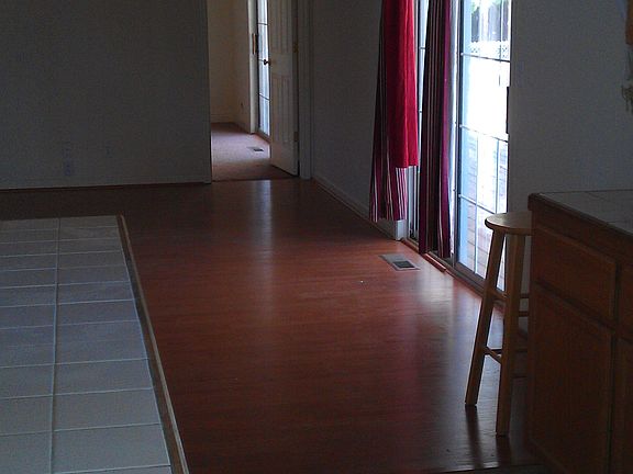 Ms-Bed via Fam Rm & Kitchen