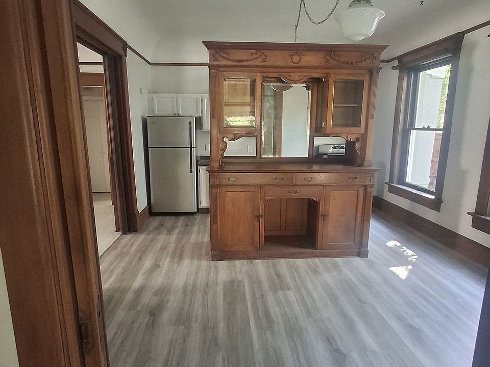 Gorgeous Hutch in dining area, tall 7' ft windows