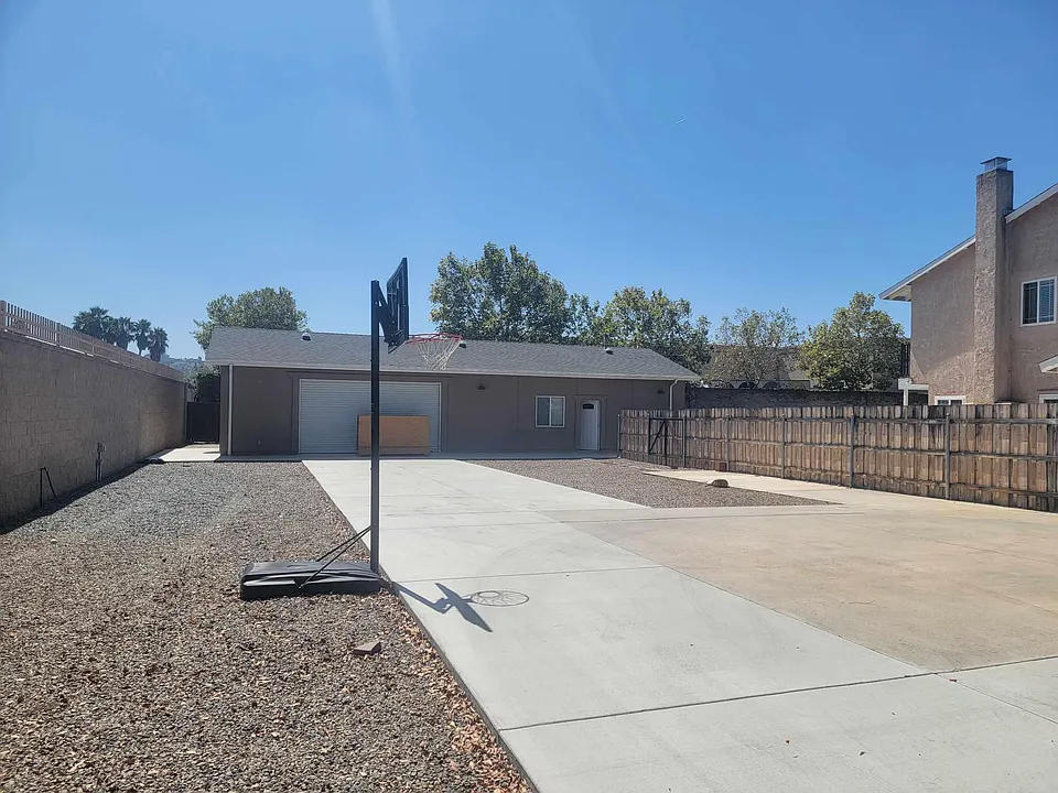 Front of unit with long driveway. (garage not included).