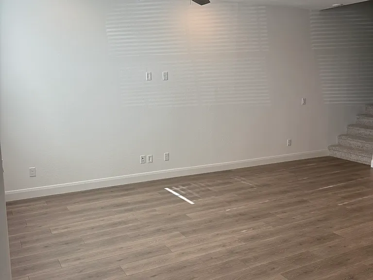 Comfortable living area with a ceiling fan