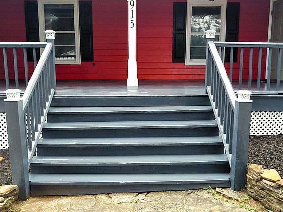 Cobble stone walkway leading up to the front porch