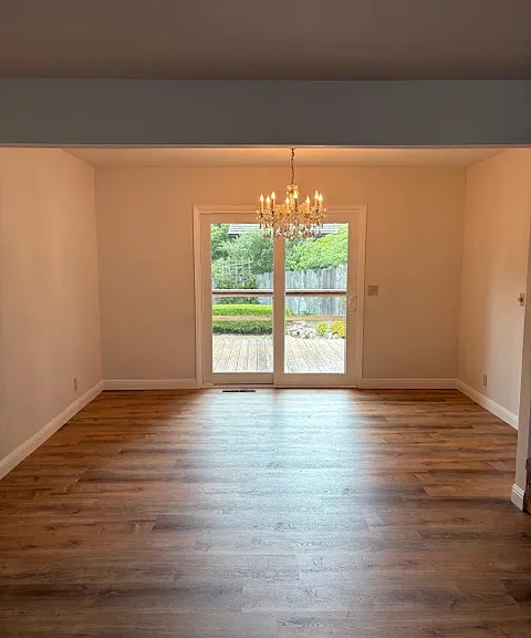 Dining room, open to the living room area. Slider to back deck.