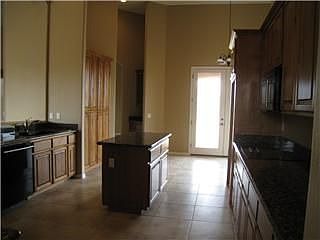 Kitchen includes great island, JenAir appliances, lg walkin pantry 