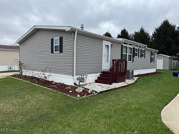 2nd image of 599 Sandtrap Cir Painesville