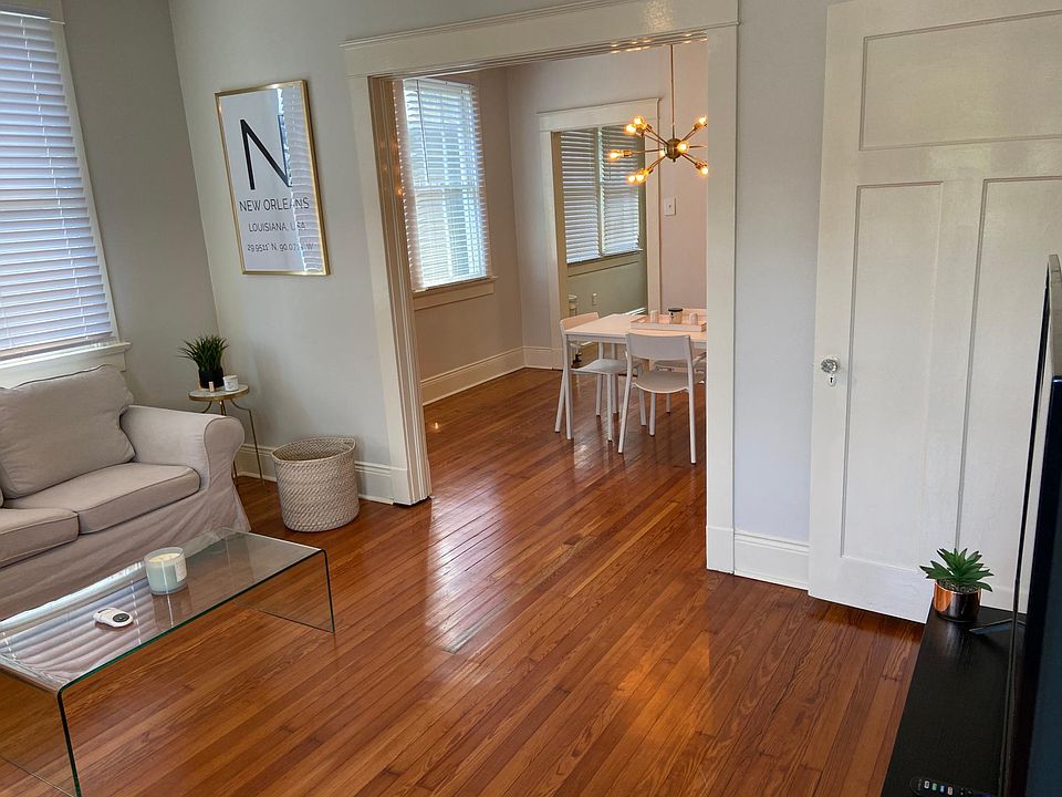 Entry, Open Living and Dining Room with 50 inch Smart TV