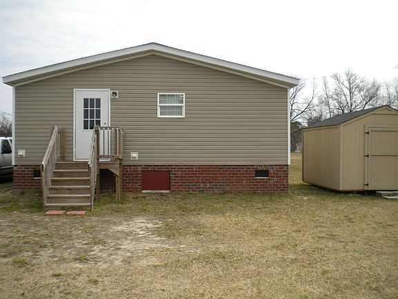 Side with Storage Building