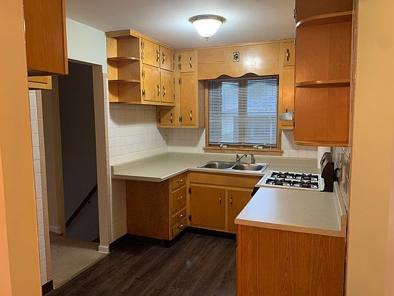 Kitchen with brand new Fridge.