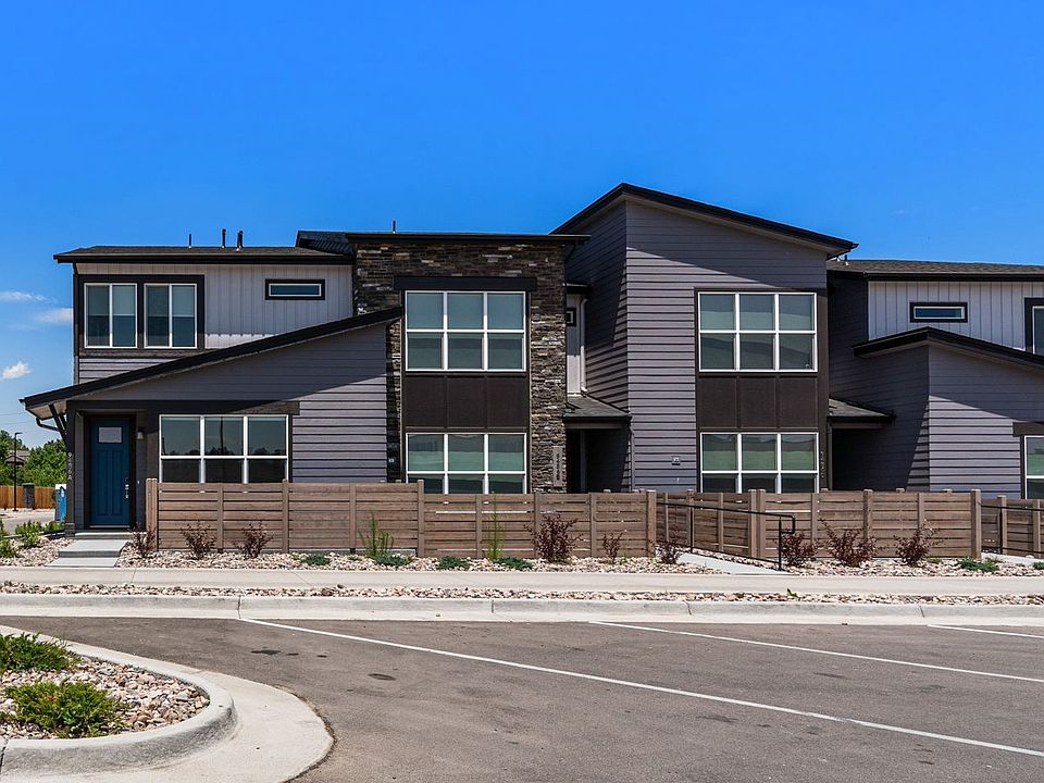 BRAND NEW, end-unit townhome on left side of four-unit building
