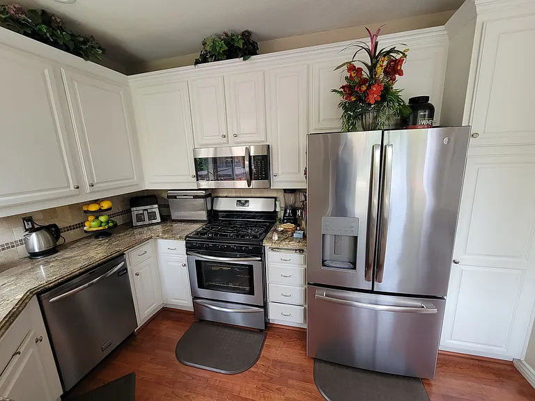 Stainless steel appliances and granite counters