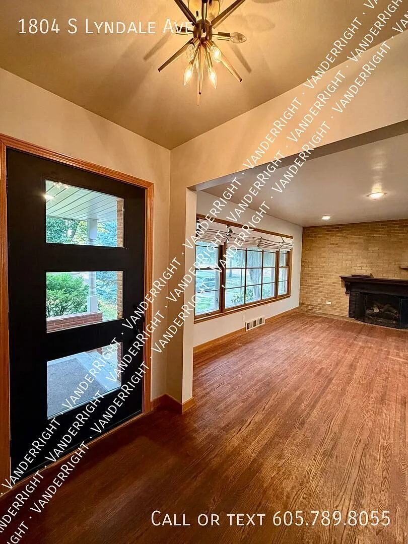 Charming 3-Bedroom Home with Hardwood Floors, Fenced Yard & Garage — Photo 1
