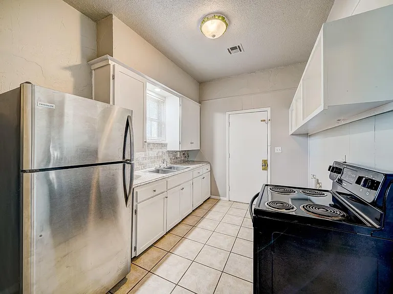 Galley Kitchen - with laundry hook-ups
